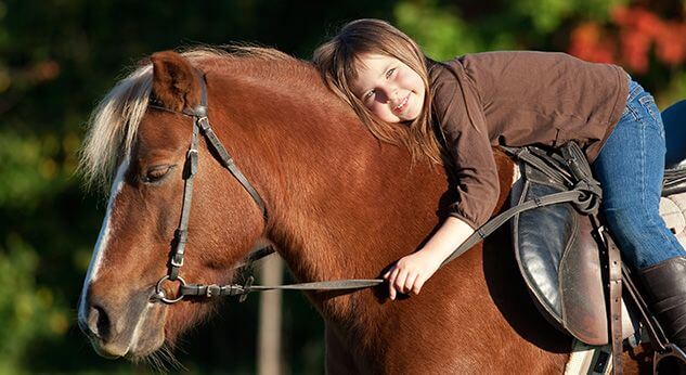 Beneficios de la equinoterapia para niños